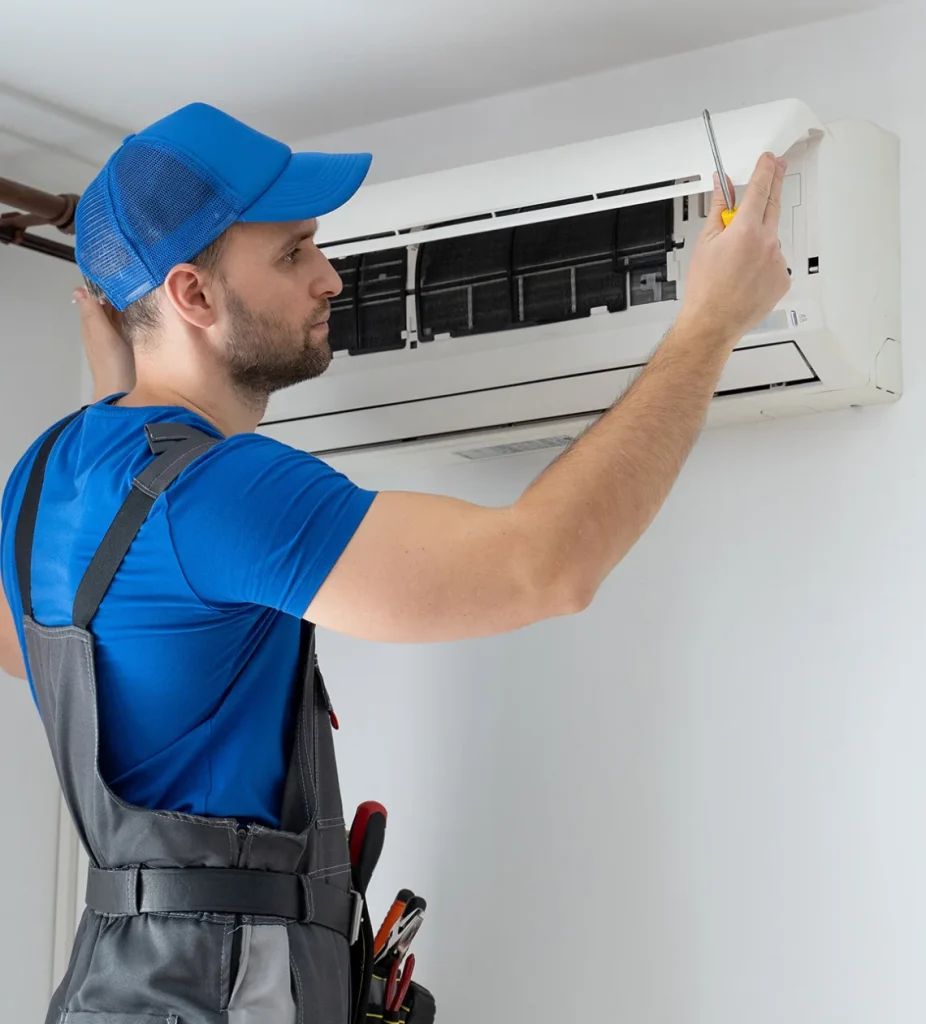 HVAC technician performing air conditioner repair in Douglas, AL, offering professional service to maintain optimal cooling performance. Serving Douglas and surrounding areas with expert AC repair solutions.